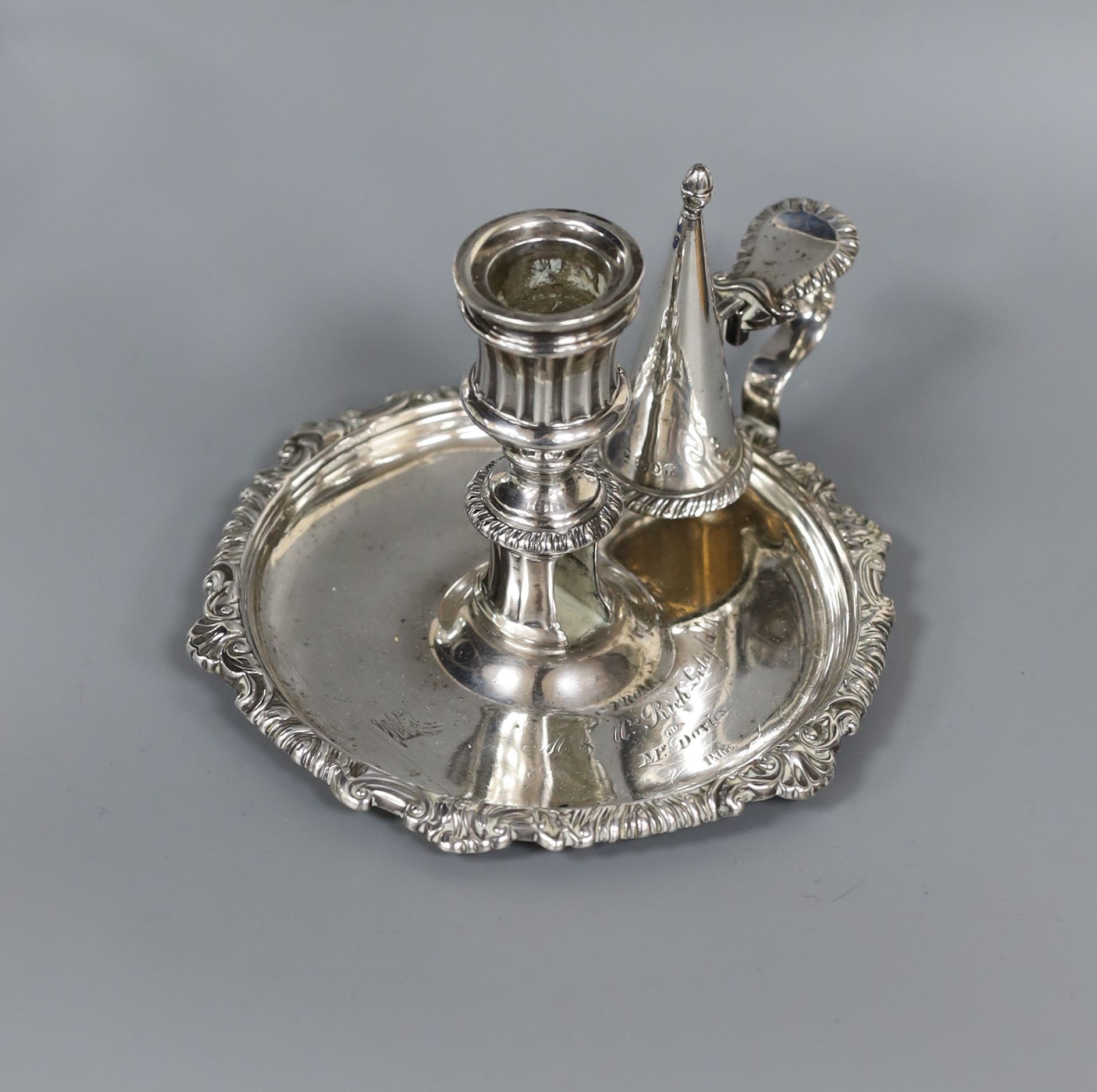 A George III silver chamberstick, John & Thomas Settle, Sheffield, 1818, lacking sconce, 16cm, 9oz.